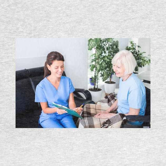 Nurse caring for senior woman (F034/9359) by SciencePhoto